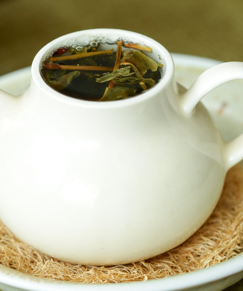 Ancient Spring liquor — clear, honeyed sheng pu'erh from ancient trees, Jinggu, Yunnan