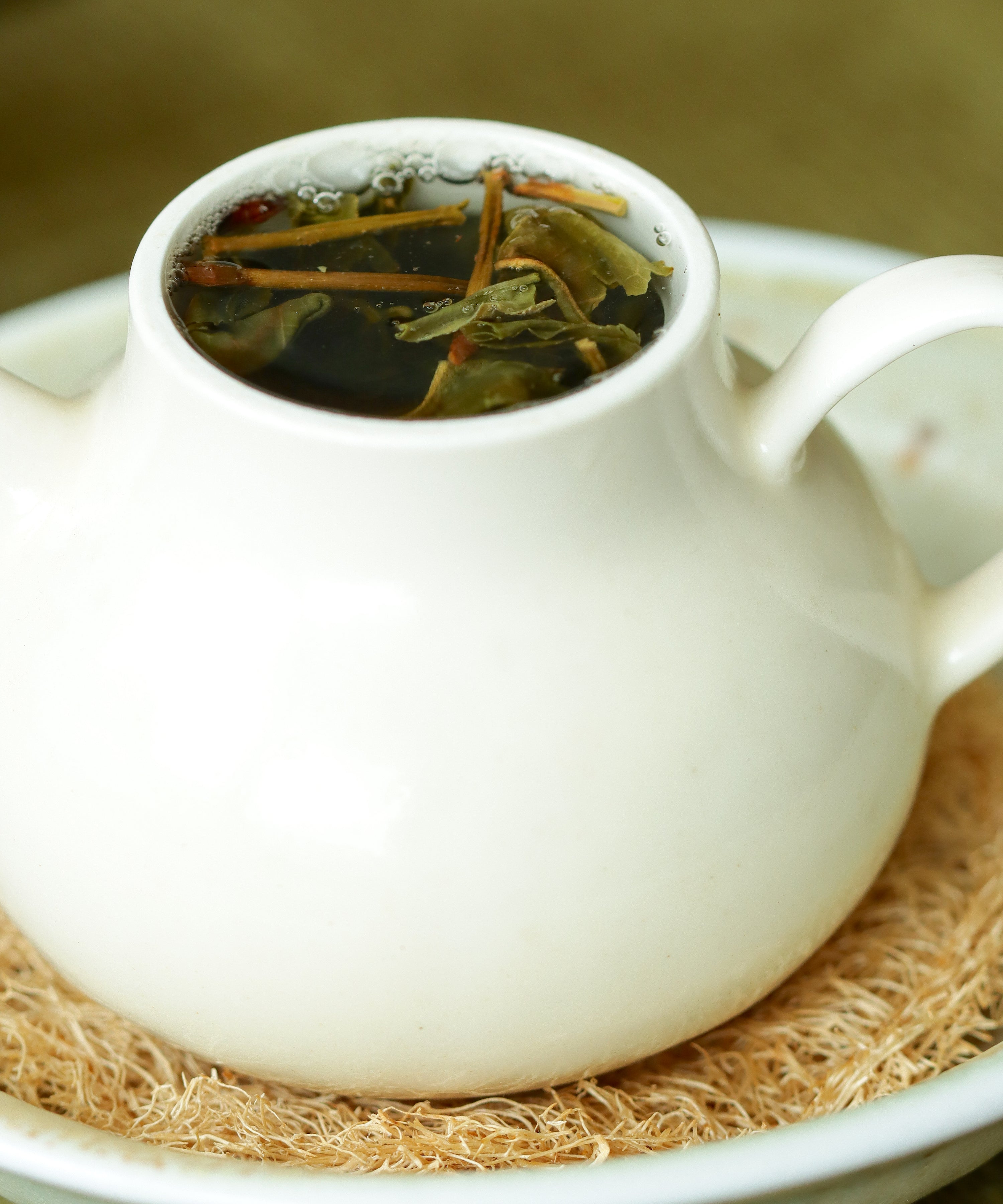 Ancient Spring liquor — clear, honeyed sheng pu'erh from ancient trees, Jinggu, Yunnan