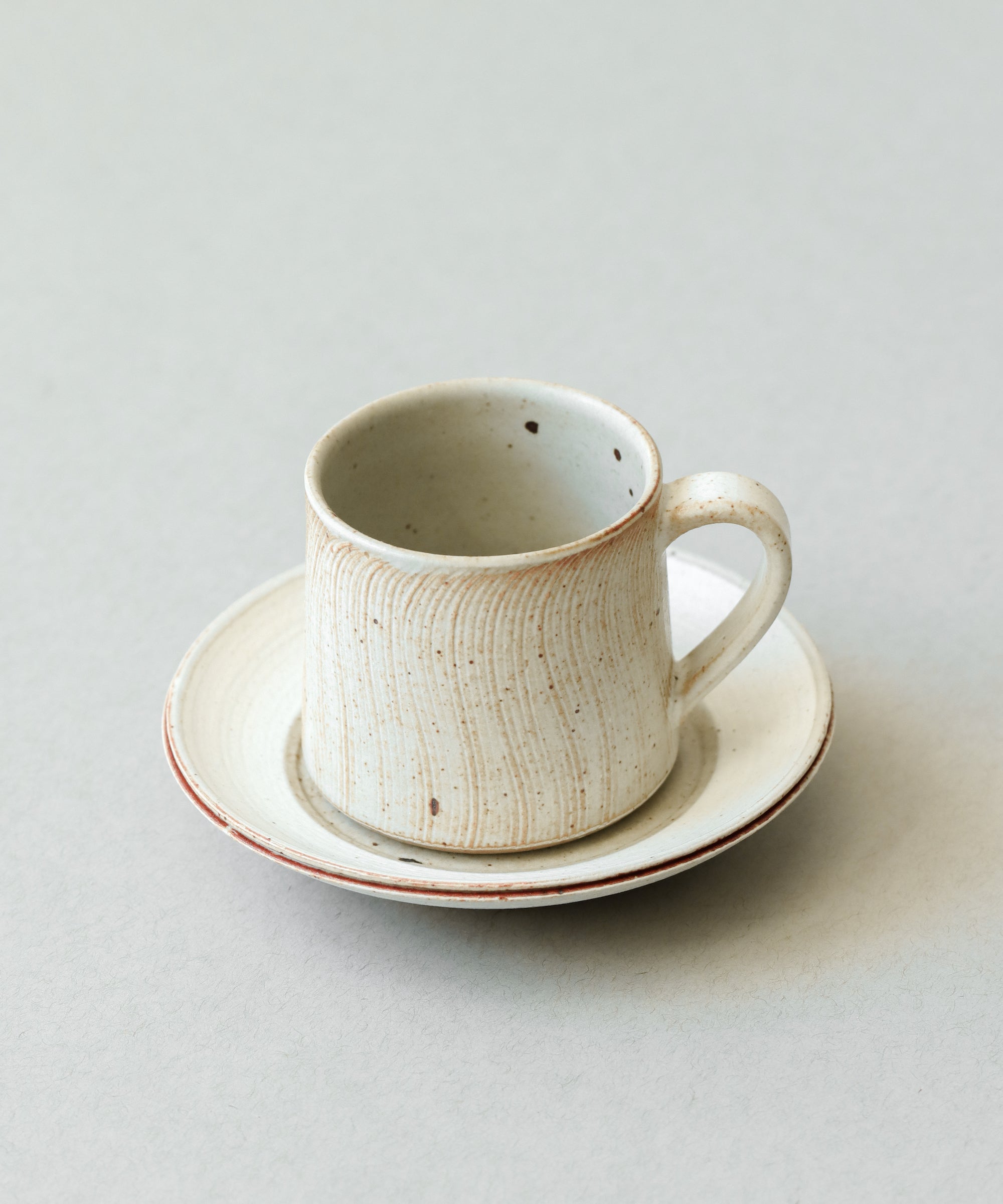 Waves Cup & Saucer Set Type II side view, stacked cup on saucer, Wang Xinghua ceramics, Jingdezhen