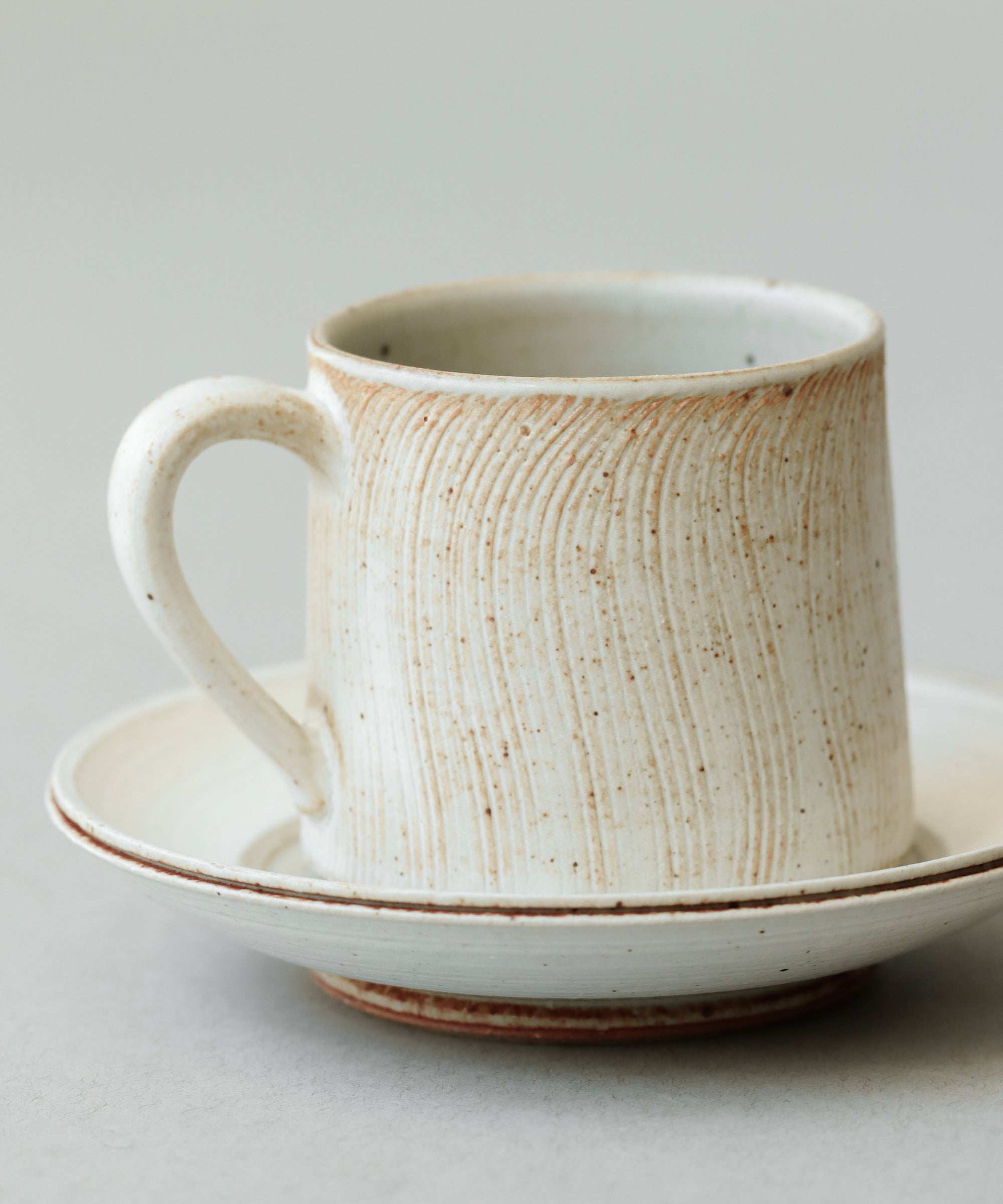Waves Cup & Saucer Set Type II cup detail, handcrafted by Wang Xinghua, Jingdezhen porcelain