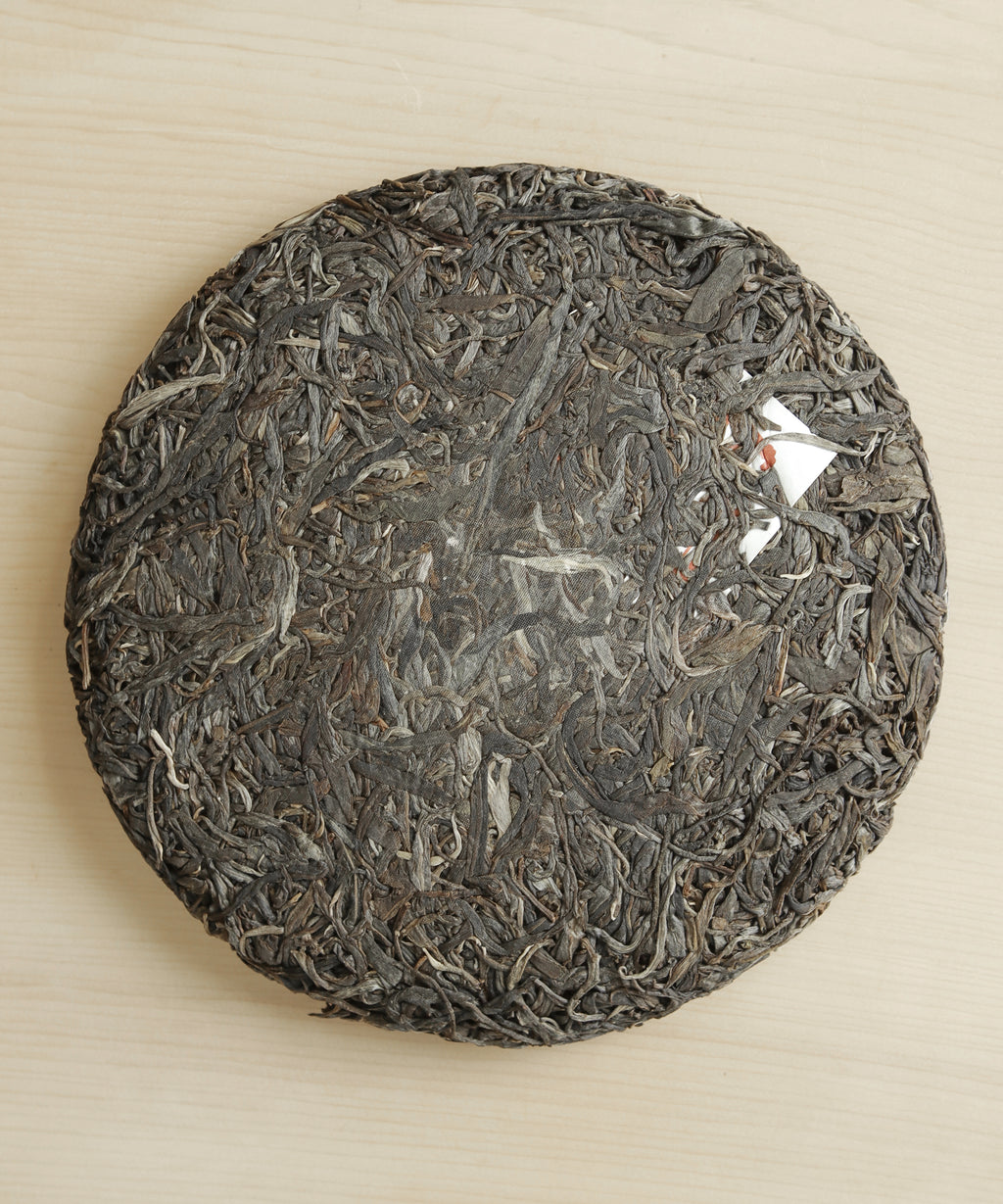 Bulangshan Sheng dry leaves — raw pu'erh from Weidong village at 6000 ft, Bulangshan, Menghai, Yunnan