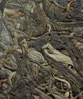 Bulangshan sheng pu'erh by Huang Rong — raw pu'erh from 100-year-old trees, Weidong village, Menghai, Yunnan
