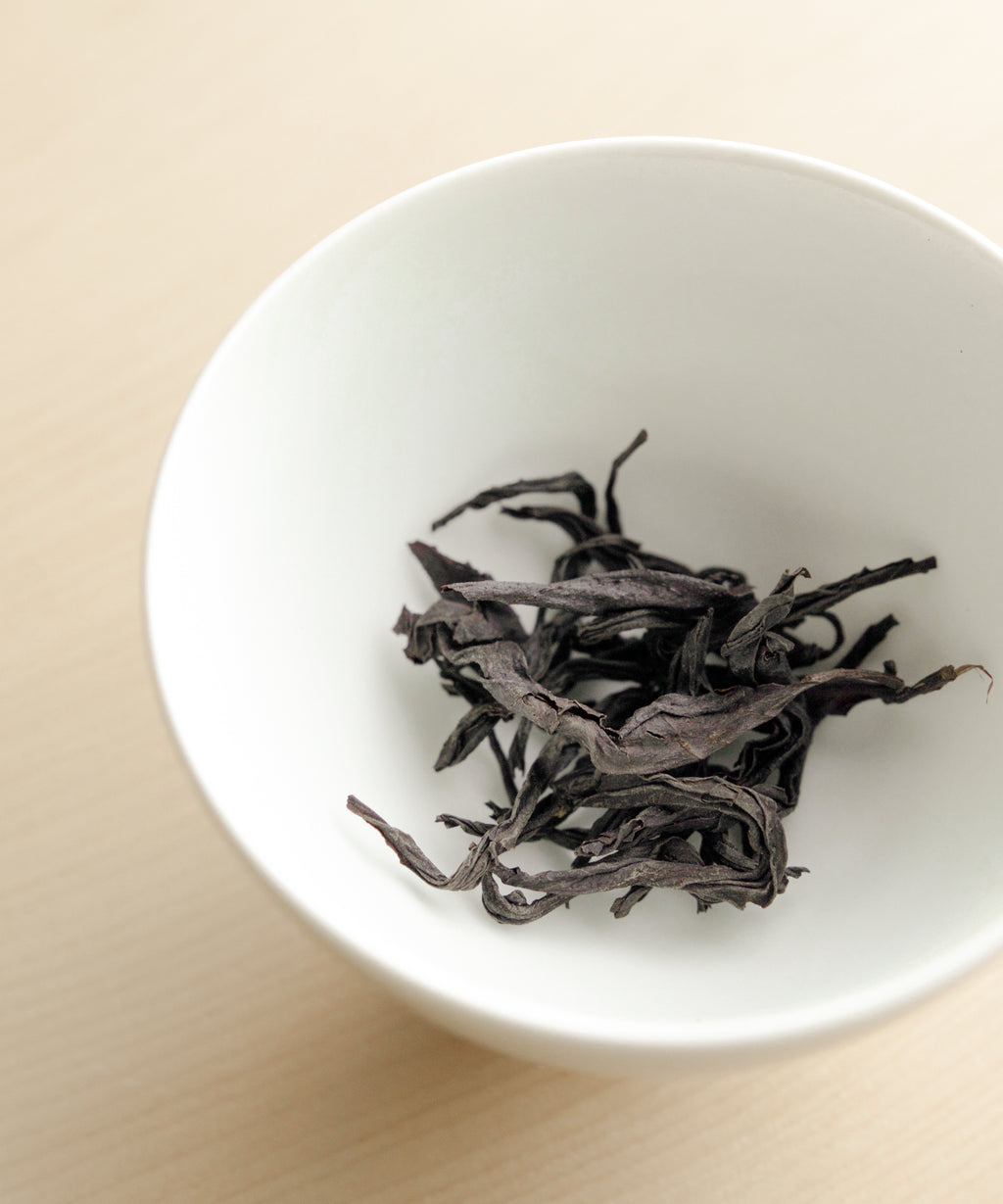 Roasted Rock dry leaves — heavily oxidized, charcoal roasted wild black tea, Zhenghe